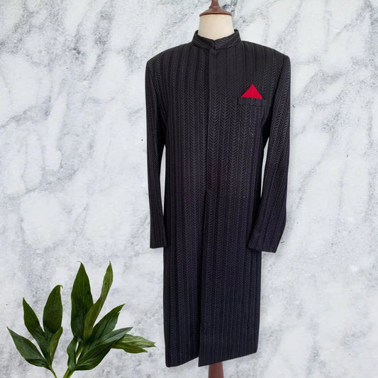 Black self-embroidered sherwani with vertical sequin pattern. Perfect for Barat and formal events. Best sherwani for groom & dulha—classic and elegant look.