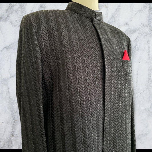 Black self-embroidered sherwani with vertical sequin pattern. Perfect for Barat and formal events. Best sherwani for groom & dulha—classic and elegant look.