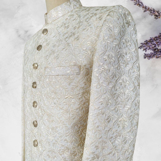 Off-white self-embroidered sherwani with gold buttons and matching kurta trousers. Groomswear edition. Best sherwani for dulha and groom—classic and elegant.