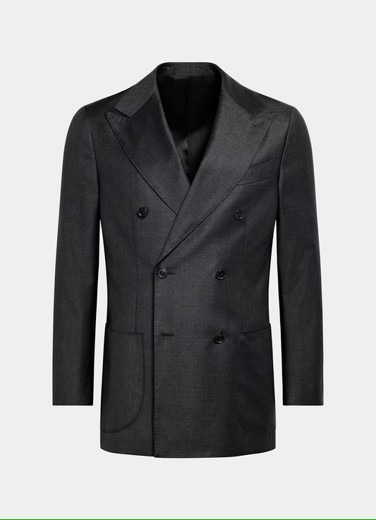 A charcoal grey double breasted suit with widened peak lapels, paired with trousers. The jacket features a mandarin collar, hidden-button placket, and side adjusters.